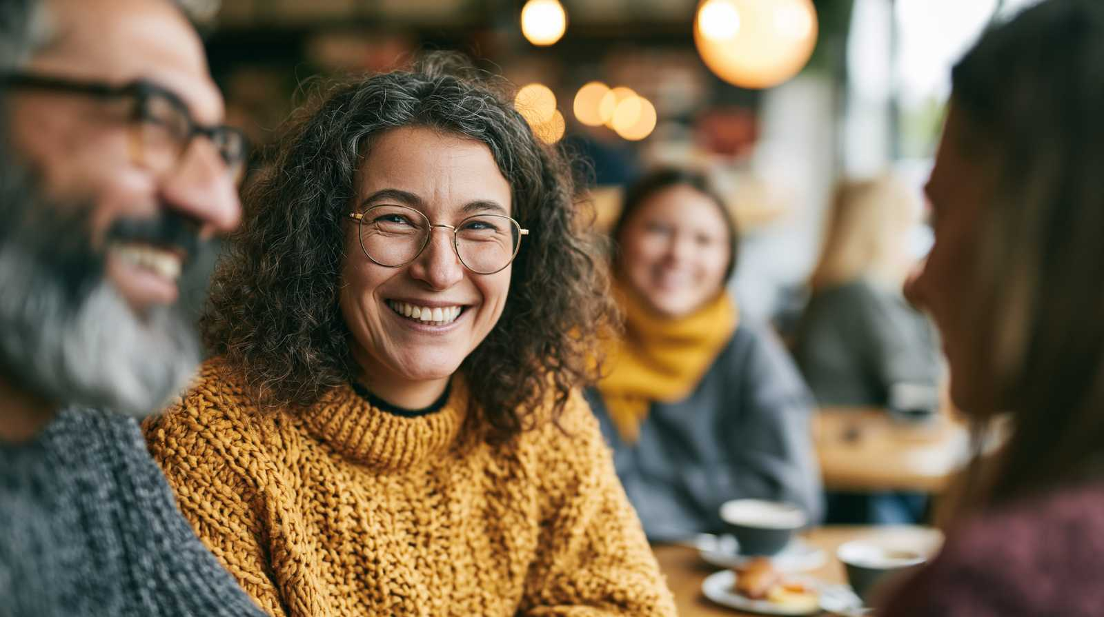 Supportive group conversation about moderation management guidelines and drinking limits, highlighting connection, accountability, and mindful alcohol use.